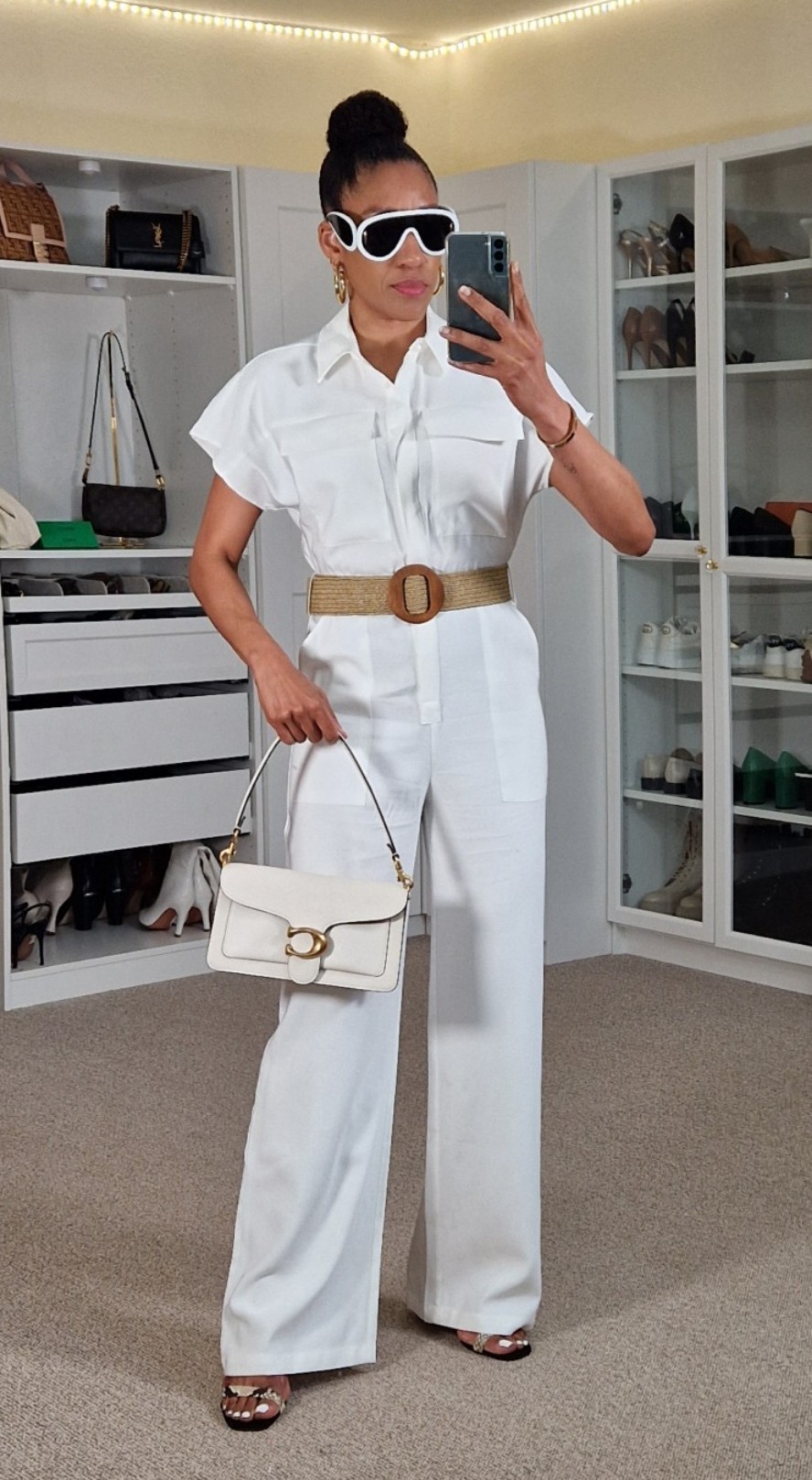 All white summer outfit wearing a  jumpsuit